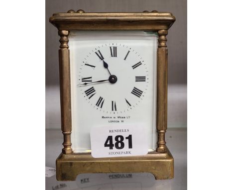 A brass and bevelled glass cased Mappin &amp; Webb carriage timepiece - back door glass missing