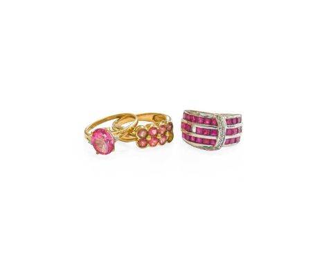 A 9 Carat White Gold Ruby and Diamond Ring, of stylised buckle form, finger size M1/2 (a.f.); A 9 Carat Gold Coated Topaz and