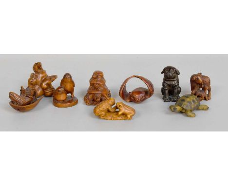 A Group of Nine 20th Century Japanese Zoomorphic Carved Wooden Netsuke