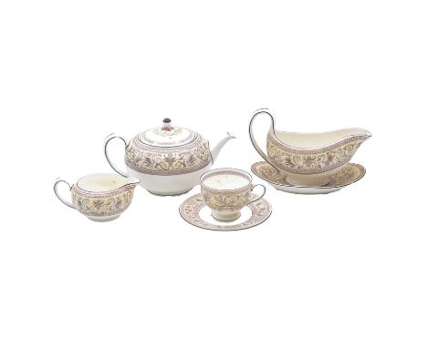 Wedgwood bone china part dinner and tea service, Florentine pattern, including an oval meat plate, sauceboat on stand, dinner