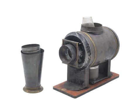 German magic lantern projector and a collection of slides, many in original boxes.