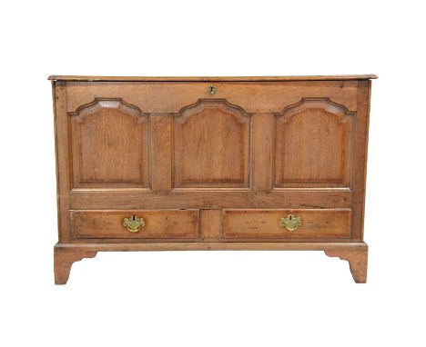 George III oak mule chest, mahogany crossbanding, hinged boarded lid, the front with three arched filede panels above two dra
