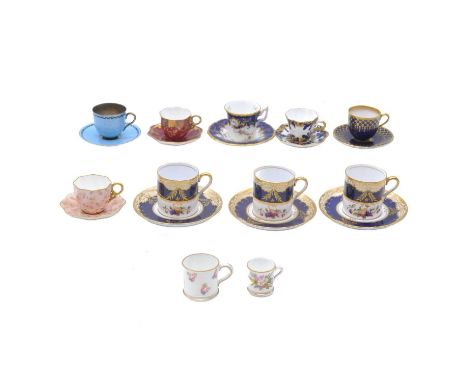 Royal Worcester royal blue ground cabinet cup and saucer, 1938; a collection of cabinet cups and saucers; three Copeland chin