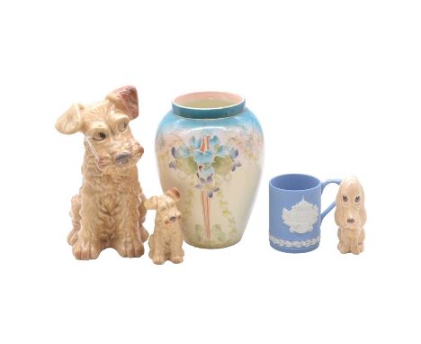 A Sylvac Cheeky Terrier, Model No. 1380; two Model No. 1378; Sylvac Seated Terrier, Model No. 1207; two Sylvac Sad Sam figuri
