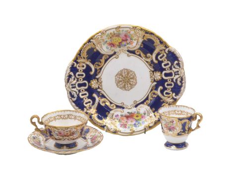 Copeland porcelain tea service, 1850-1880, painted with sprays of summer flowers, royal blue borders, including a pair of cak