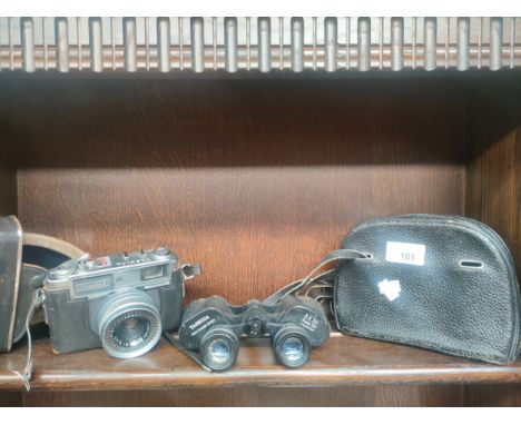 A Yaschica Minimatic-C camera in case and Yashica binoculars in carry case 