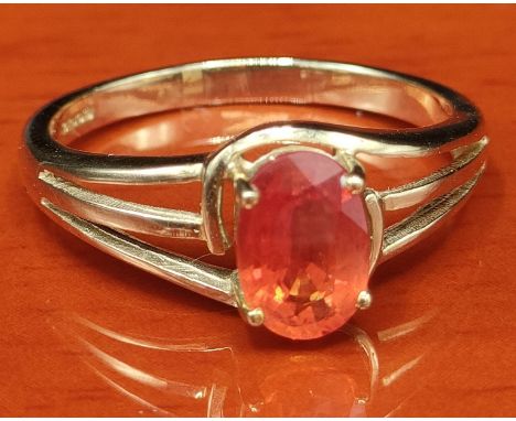 9ct yellow gold ring set with a single oval cut fire opal stone. [Ring size N] [2.36Grams] 