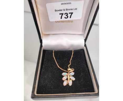 A 9ct yellow gold necklace with a 9ct yellow gold and opal stone pendant. [3.86grams] 