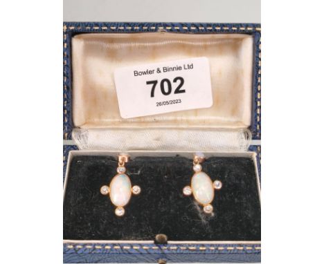 A Pair of Antique 9ct yellow gold earrings set with opals and diamonds. [3.02grams] 