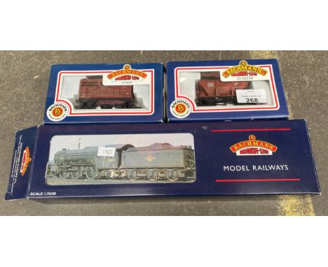 A Bachmann oo gauge boxed loco and tender Green arrow along with 2 Boxed Bachmann wagons 
