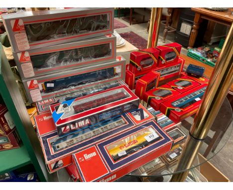 A Selection of lima boxed carriages, Diesel loco along with selection of boxed hornby carriages and wagons 