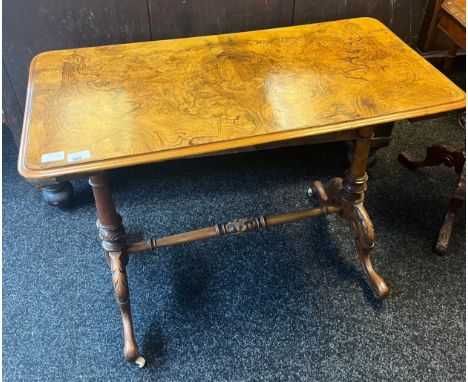 Victorian burr walnut console, supported on twin turned pedestal with out swept feet.[70x91x45cm] 