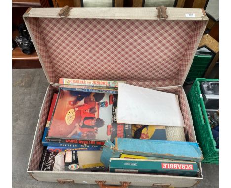 A Vintage travel trunk of vintage board games to include scrabble 