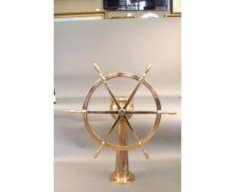 Ships Wheel on Stand by Oregon Brass Works Highly polished ships wheel on geared pedestal.  Pedestal is fitted with a rudder 