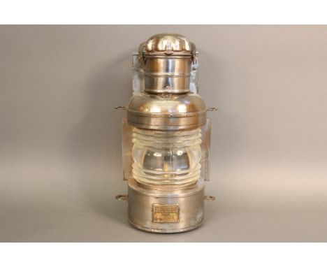 Steel Masthead Lantern Polished steel masthead lantern with fresnel glass  lens. With brass makers badge from the Republic  o