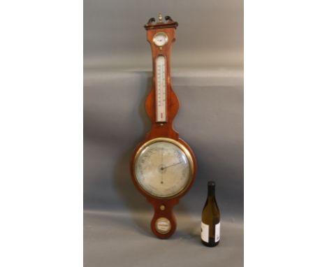 Mahogany Banjo Barometer Antique banjo barometer with rain-fair dial,  thermometer, and level. Arched pediment top with  bras