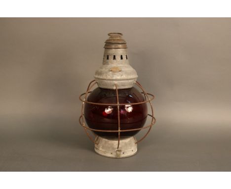 Perko Ruby Glass Distress Lantern Rarely found Perko distress lantern with  protective cage, brass hoisting ring, steel body,