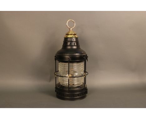 Perko Steel Ships Anchor Lantern Fine old Perko ship lantern with fresnel lens,  protective cage, brass burner, and brass hoi