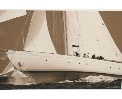 Black and White Print of Yacht Black and white photo print of a sailing yacht  underway with a group gathered along the port 