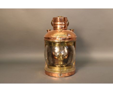 Copper Ships Masthead Lantern Copper and brass ships masthead lantern with  original oil burner, bulbous glass lens, and carr