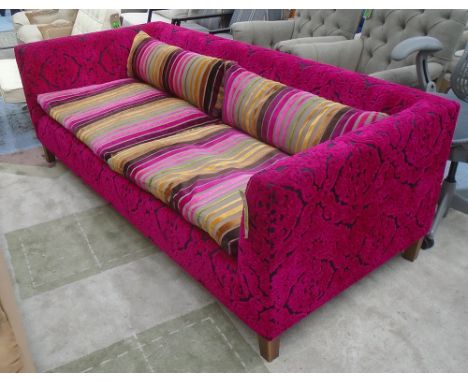 DESIGNERS GUILD SOFA, with pink patterned upholstery and multicoloured striped loose back and seat cushions, 211cm L x 73cm H