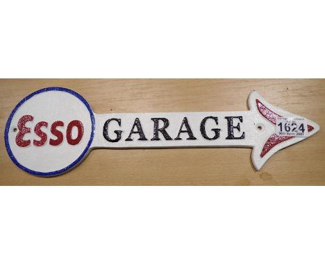 Cast iron Esso Garage arrow sign, 30 x 10 cm. P&amp;P Group 2 (£18+VAT for the first lot and £3+VAT for subsequent lots) 