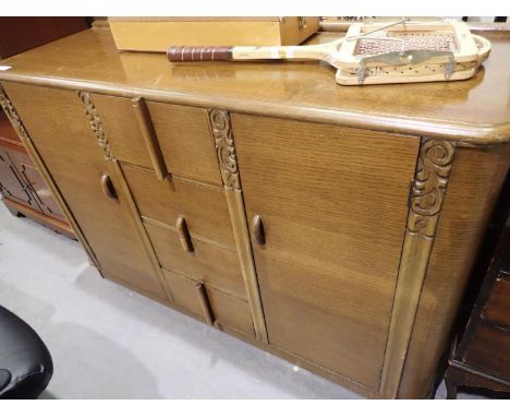 Oak vintage sideboard with two doors and four central drawers, 135 x 50 x 90 cm H. Not available for in-house P&amp;P, contac
