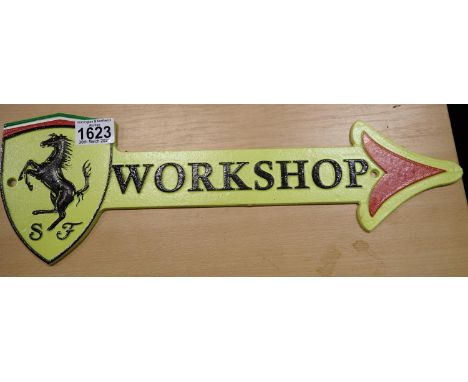 Cast iron Ferrari large workshop arrow plaque, 40 x 12 cm. P&amp;P Group 2 (£18+VAT for the first lot and £3+VAT for subseque