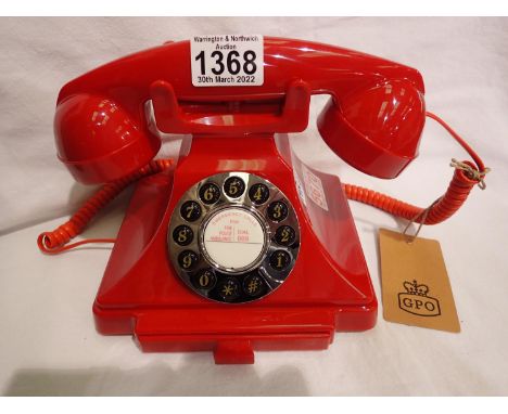 Red, GPO Carrington, push button telephone in 1920s styling with pull-out pad tray, compatible with modern telephone banking 
