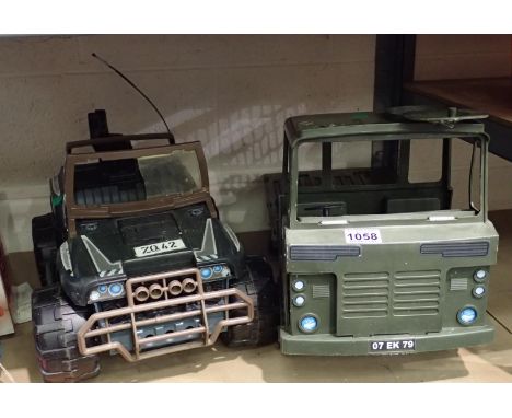 Two plastic toys army trucks. Not available for in-house P&amp;P, contact Paul O'Hea at Mailboxes on 01925 659133 