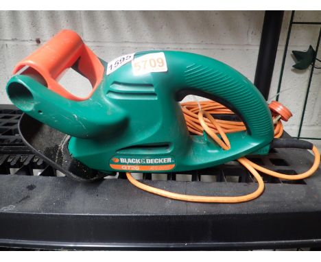 Black & Decker GT26 electric hedge trimmer. Not available for in-house P&P, contact Paul O'Hea at Mailboxes on 01925 659133Co