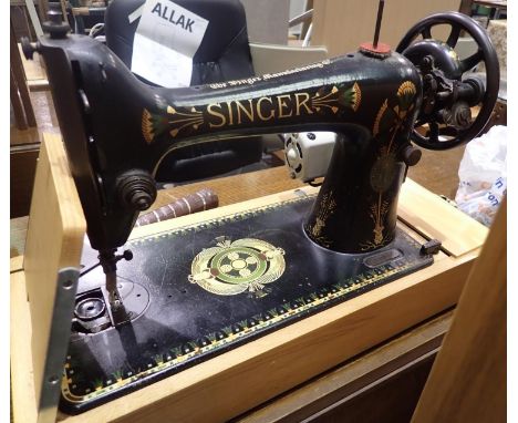 Cased Singer sewing machine and a vintage Perfecto tennis racket. Not available for in-house P&amp;P, contact Paul O'Hea at M