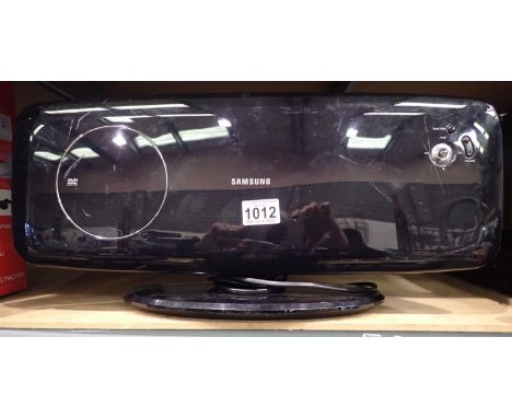 Samsung HTQ100 DVD player with matching speakers. Not available for in-house P&P, contact Paul O'Hea at Mailboxes on 01925 65