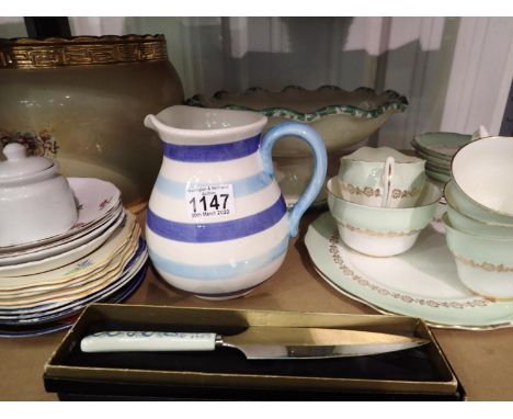 Shelf of mixed ceramics including tea cups/saucers and a large vase, D: 20 cm. Not available for in-house P&amp;P, contact Pa