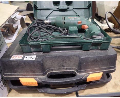 Cased Extreme Electric router and a Bosch 650 watt electric drill. Not available for in-house P&P, contact Paul O'Hea at Mail
