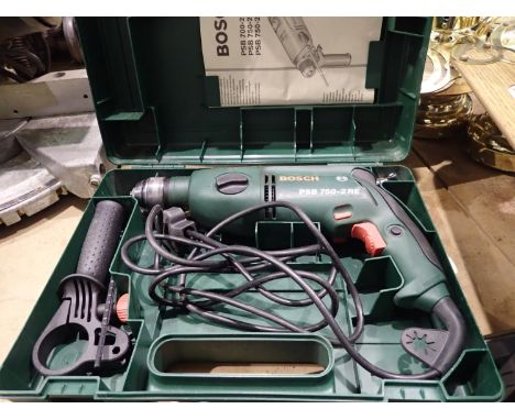 Bosch PSB 750-2 RE drill. Not available for in-house P&P, contact Paul O'Hea at Mailboxes on 01925 659133Condition Report: Al