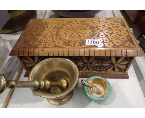 Carved wooden box containing a brass and ceramic pestle and mortar, box 34 x 19 x 12 cm H. Not available for in-house P&amp;P