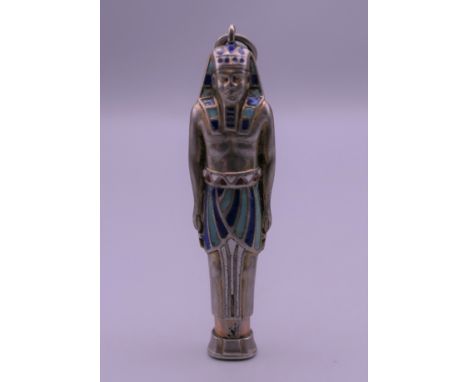 A late 19th/early 20th century Continental silver and enamel propelling pencil formed as a pharaoh. 6 cm long extended. 
