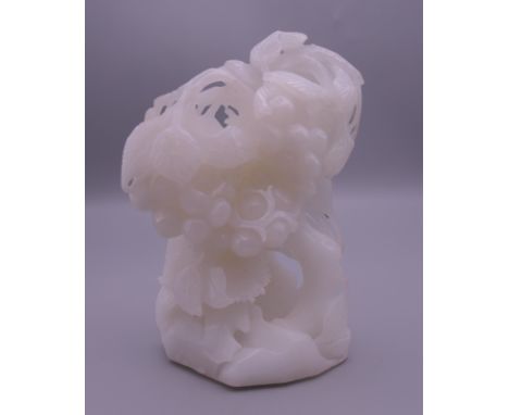 A small white jade carving. 11.5 cm high.