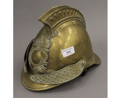 A vintage French brass fireman's helmet.