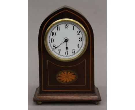 An Edwardian inlaid mahogany mantle clock. 22 cm high.