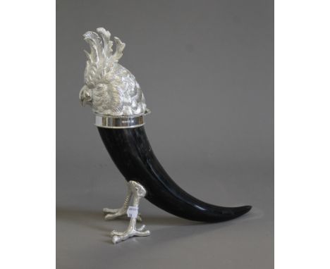 A silver plated and horn bird inkwell. 32 cm high.