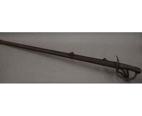 A 19th century Cavalry sword and scabbard. 115 cm long.