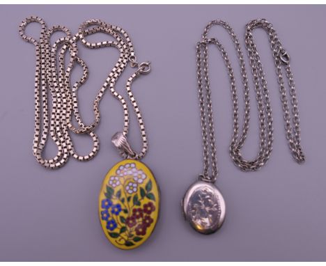 An enamel decorated silver locket on chain and another. The former 3.5 cm high.
