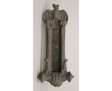 An A Kenrick and Sons cast iron letter box/knocker. 24 cm high.