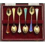 A set of six Norwegian silver gilt enamel teaspoons. 58.2 grammes total weight.