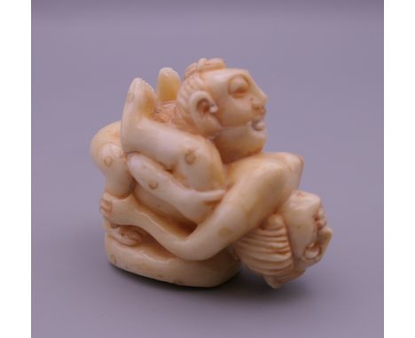 An erotic bone netsuke. 3.5 cm high.