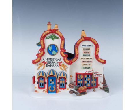 Christmas Bread Bakers porcelain figurine. This item has its original box that measures 10.75"L x 9.5"W x 8"H. Department 56 
