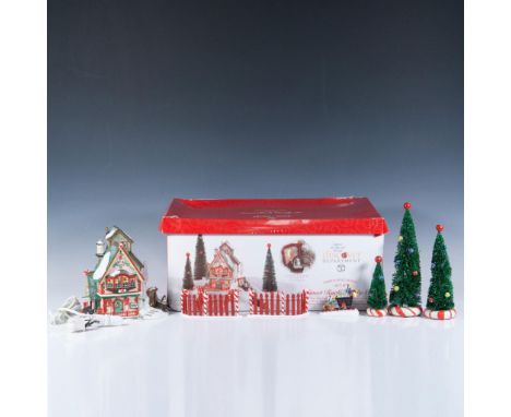 This is the Department 56 Sweet Rock Candy Co. North Pole Series Gift Set. It includes the porcelain lighted building, three 