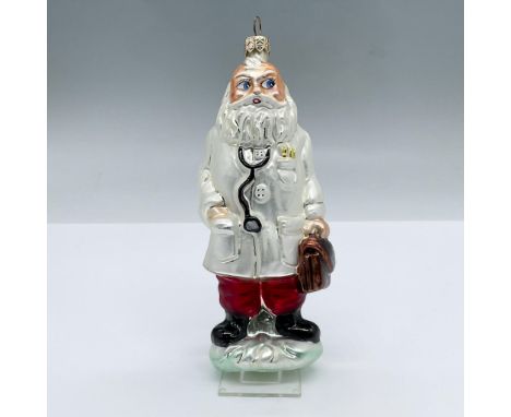 Features Santa Claus fashioned in a physicians white lab coat along with a stethoscope and briefcase. Tag reads Christopher R